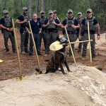 A Florida State Guard dog showing the groundbreakers how it's done this afternoon off Justice Lane. (Andy Dance)