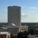 The state house's legislative tower is in the center, the white Turlington Building, to the right, houses the Florida Department of Education. (© FlaglerLive)