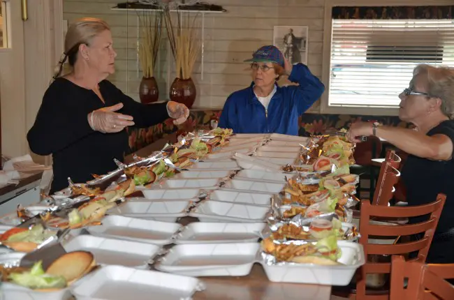 At 2:15, the State Street diner- served 25 meals to the first responders and the hazmat team, with help from Bunnell Mayor Catherine Robinson, center, and servers Michelle MacDonald, right, and Trish D'Amico. (c FlaglerLive)