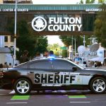 Fulton County Sheriff officers block off a street in front of the Fulton County Courthouse on August 14, 2023 in Atlanta, Georgia. (Joe Raedle/Getty Images)