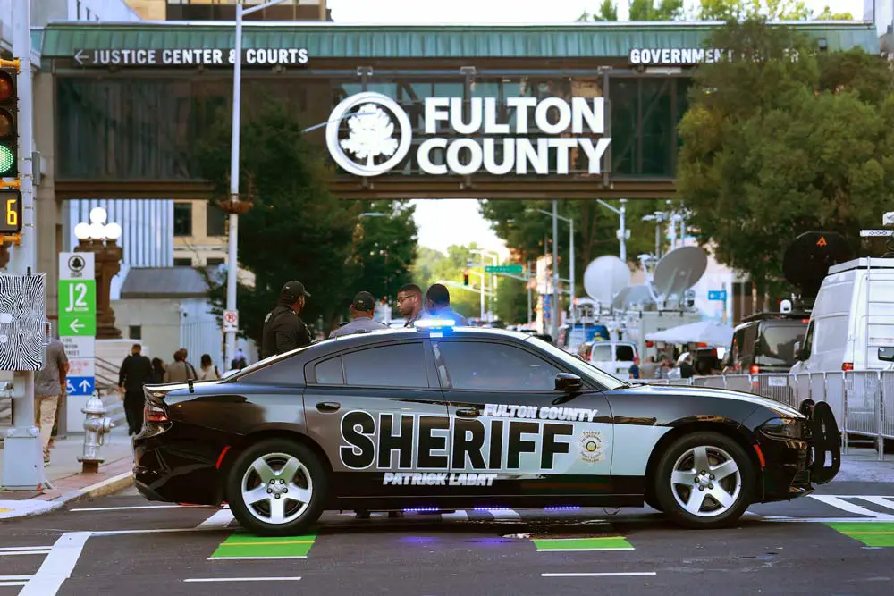 Fulton County Sheriff officers block off a street in front of the Fulton County Courthouse on August 14, 2023 in Atlanta, Georgia. (Joe Raedle/Getty Images)