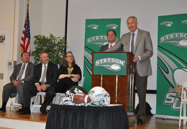 Roger Hughes at the press conference where he was announced as Stetson's new head football coach. From left, DeLand Mayor Bob Apgar, Stetson Board of Trustees Chair Harlan "Butch" Paul, Stetson President Wendy Libby and Athletic Director Jeff Altier.