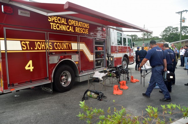 The St. Johns County Fire Rescue HazMat team preparing for the handling of the package. (c FlaglerLive)