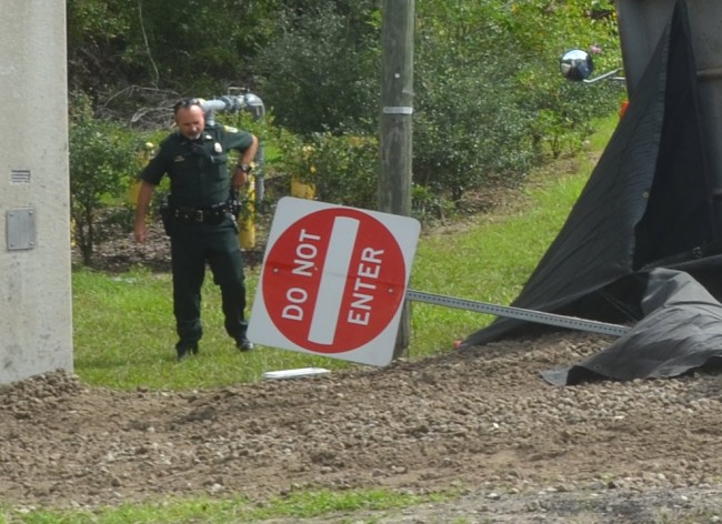 dump truck stop sign wreck scene