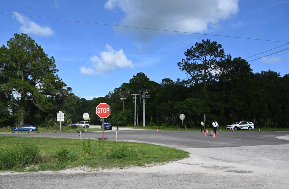 The stop signs on County Road 304. (© FlaglerLive)