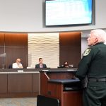 It's familiar grounds for Chief Mark Strobridge, seen here addressing the City Council on budgetary issues in a 2021 meeting. He was not at Tuesday's meeting. (© FlaglerLive)