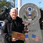 Flagler County Sheriff’s Office Chief of Staff Mark Strobridge holding 2025 Colonel Gary E. DeKay Veteran of the Year Award and plaque. (FCSO)