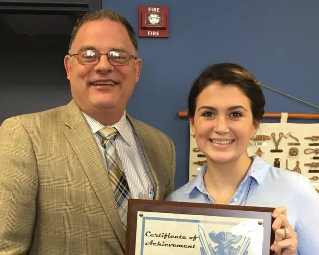 Kelsey Sweeney is this month's Senior of the Month at Matanzas High School,  where she is pictured here next to Principal Jeff Reaves. (MHS)