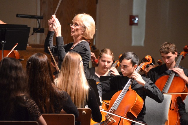 Sue Cryan conducting the FYO's  Harmony Chamber  Ensemble earlier this year at the Methodist church. (© FlaglerLive)