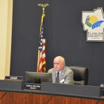 Speaking for most of the Flagler County Commission, Commission Chairman Dave Sullivan today did not address a request by residents for a statement of public support for all citizens, regardless of party, following more criticism of Joe Mullins's statements online. Mullins is to the left. (© FlaglerLive)
