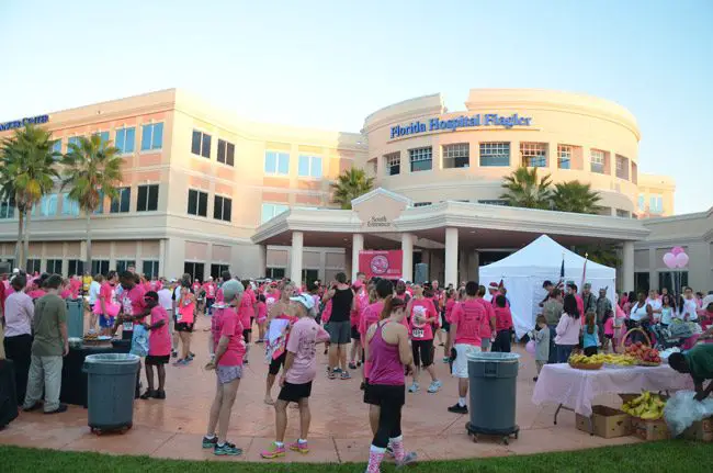 Runners and walkers gather at dawn Sunday in front of Florida Hospital Flagler for the annual Pink Army Run for breast-cancer awareness and research. See below. (© FlaglerLive)
