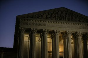 The U.S. Supreme Court building at dawn in Washington, D.C.