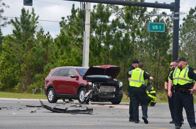 The red SUV was pulling out of Education Way. (© FlaglerLive)