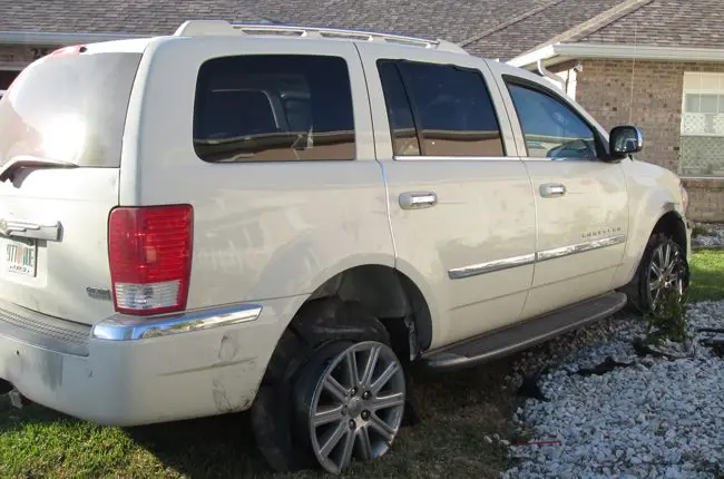 The SUV Richard Knoblaugh drove and crashed in his own C-Section yard Monday evening. (FCSO)