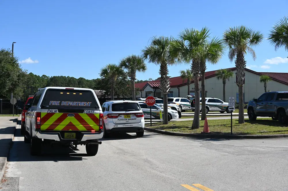 Rymfire Elementary's parking lot was a swarm of sheriff's and other public safety vehicles as a student at the school made what turned out to be another false report of an active shooter. (© FlaglerLive)