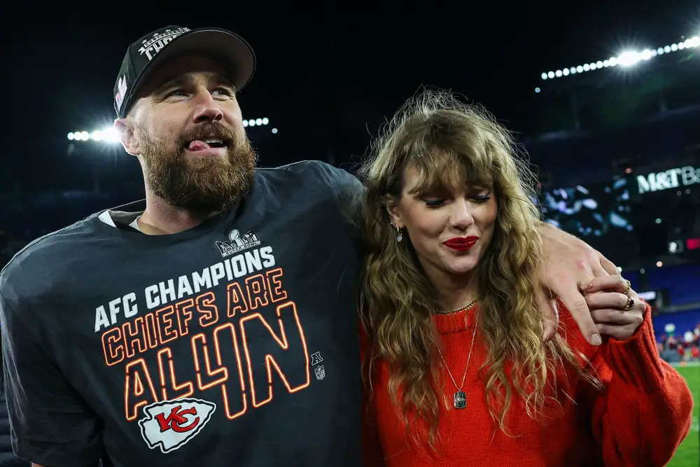 Travis Kelce celebrates with Taylor Swift on Jan. 28, 2024, after the Kansas City Chiefs defeated the Baltimore Ravens in the AFC championship game. 