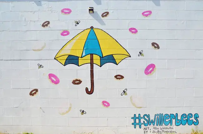 The mural outside of Swillerbees in Flagler Beach is the work of Allie Wisniewski and Bailey Pemberton. (© FlaglerLive)