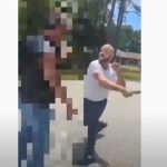 Rafael Vincent Rivera seen swinging with a knife at a man following a road rage incident Tuesday in Palm Coast. (© FlaglerLive via YouTube)