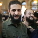 Supporters greet Abu Mohammed al-Golani as the Umayyad Mosque in Damascus on Dec. 8, 2024.