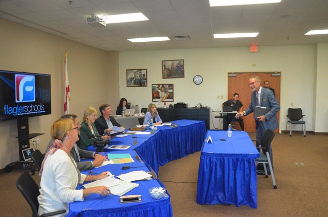 The next stop for James Tager, right, is to negotiate his contract. He starts work for the Flagler County School Board on June 1. (© FlaglerLive)