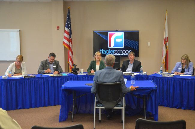 The School Board near the end of its interview with James Tager today. From left, Collen Conklin, Andy Dance, Janet McDonald, Tager, Trevor Tucker and Maria Barbosa. Click on the image for larger view. (© FlaglerLive)