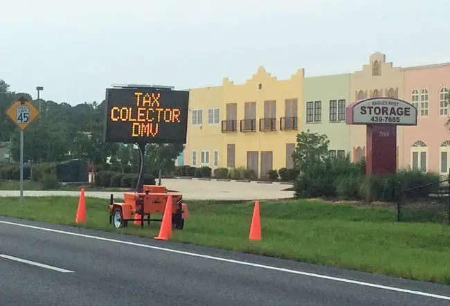 Flagler County Emergency Services installed a temporary electronic sign on behalf of the tax collector to direct traffic to the collector's relatively new branch in Flagler Beach. That city's commissioners did not like it. (© FlaglerLive)