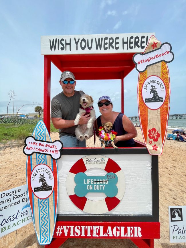 The Tourist Development Council's dog-kissing booth. (© AJ Neste for FlaglerLive)