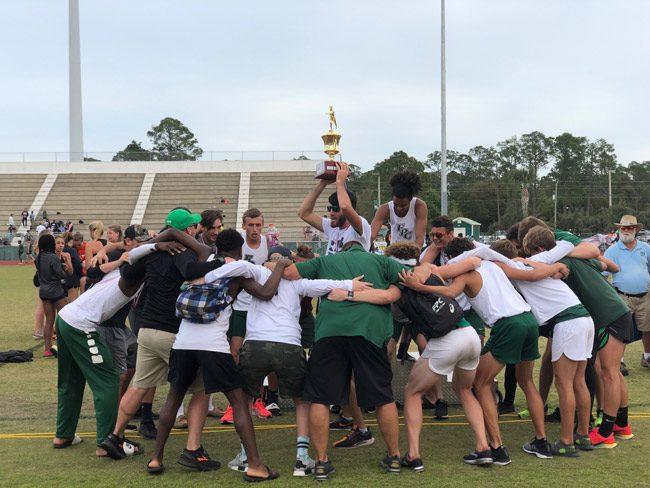 The Flagler Palm Coast High School track team Curtis Gray had joined, celebrating a victory at FPC on March 9. (Tracey Miley)