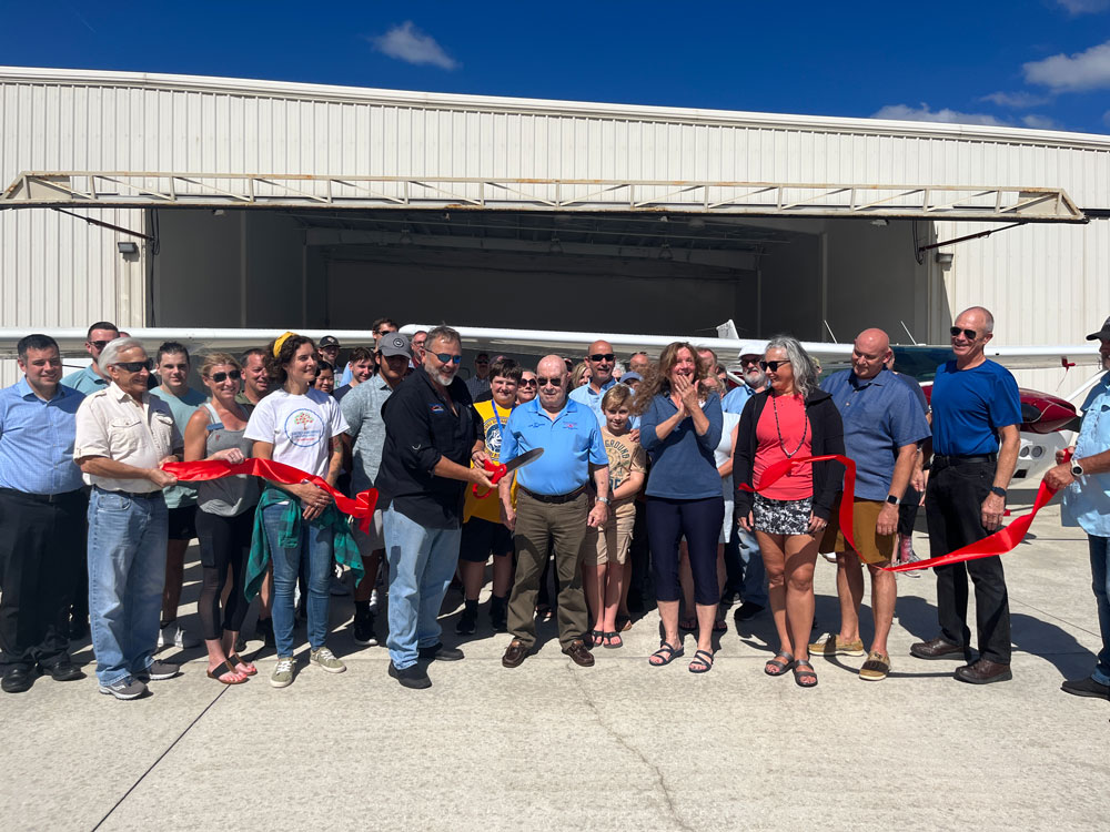 Teens-In-Flight President Ricky Carson "Ric" Lehman at a 2022 ribbon-cutting for a hangar at the county airport. (Teens-in-Flight)