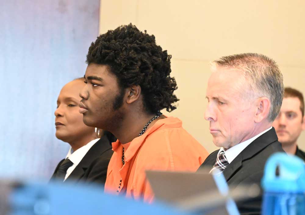Brendan Depa, center, with his attorney, Kurt Teifke, right, in court on May 1. (© FlaglerLive)