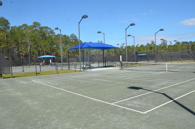 Six of the tennis center's 10 courts were not in use at 10:30 this morning, but players said the center is much busier earlier in the morning, and league players were arriving for play later. (© FlaglerLive)