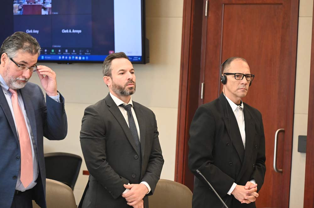 Monserrate Teron, right, facing the jury pool during jury selection on the first day of his trial in late May, with his attorneys, Harley Brook, left, and Derek Maines. (© FlaglerLive)