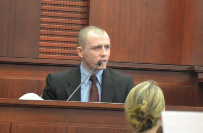 Michael Wilson testifying during his June trial. He had turned down an offer to plea and take 10 years in prison.  (© FlaglerLive)