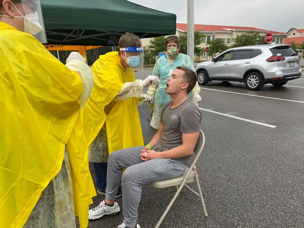 Third year medical student Casey Kelly, who attends the Alabama College of Osteopathic Medicine, getting tested at the Palm Coast campus of Daytona State College last week, a testing location run by Flagler Emergency Management and the Flagler Health Department. (Flagler County)