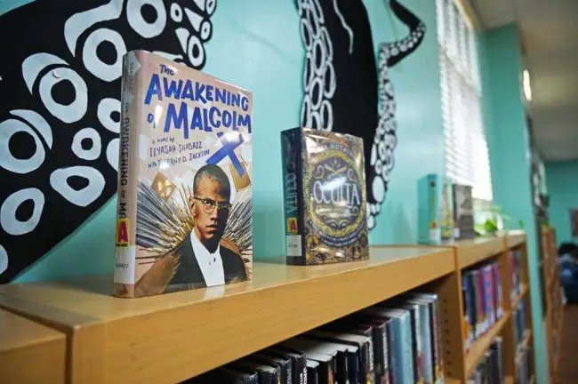 "Of all our studies, history is best qualified to reward our research," Malcolm X had said. A book about him was displayed in the Flagler County Public Library's Teen Spot this week. (© FlaglerLive)