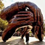 Bacardi Jackson by "The Embrace," the Hank Willis Thomas sculpture on Boston Common in Boston. (Instagram)