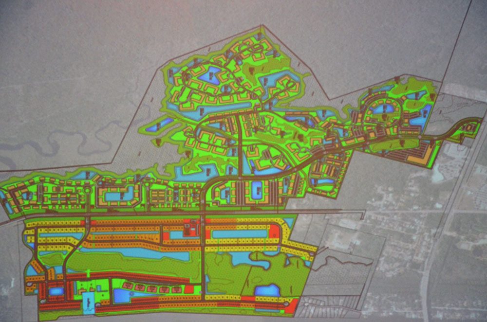 The original plan for The Gardens development would have straddled John Anderson Highway with nearly 4,000 dwellings built over decades, as shown in a sketch presented to the public at a July meeting in Palm Coast. The plan has since been scaled back, for now, to 330 dwellings on the east side of John Anderson. But that plan drew a condition from county planning: a rezoning would be in order. (© FlaglerLive)