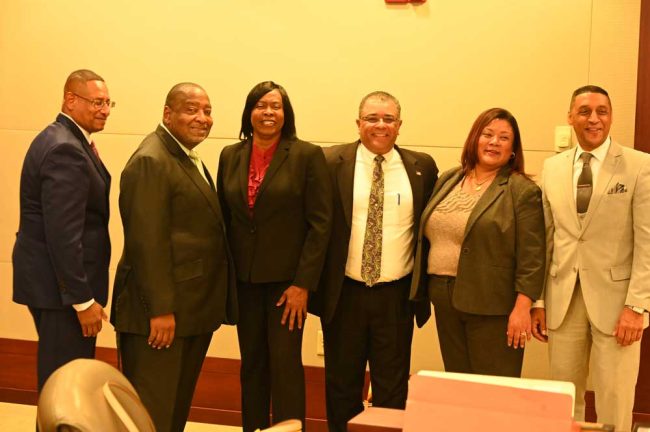 From left, Stephen Knight, retired Judge Hubert Grimes, Circuit Judges Joan Anthony, Raul Zambrano and Alicia Washington, and Marc Dwyer. (© FlaglerLive)