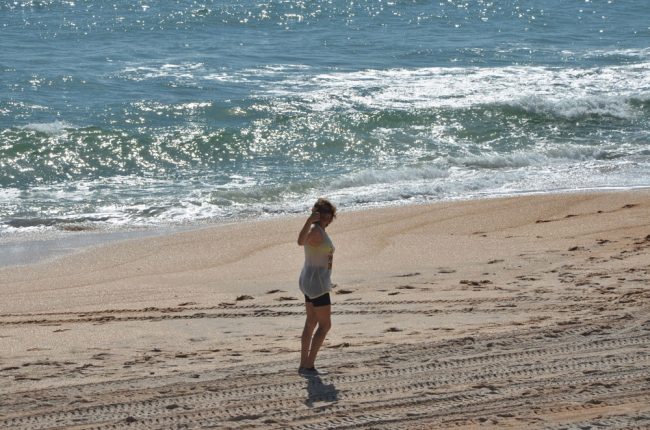 Nancy Rivero of Palm Coast summed up many people's reaction to the beaches reopening this morning. (© FlaglerLive)