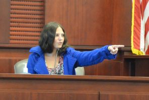 Tiffany Norman, pointing at Canales in the only moment she deigned look at him the entire trial. She had been asked to identify him. Click on the image for larger view. (© FlaglerLive)