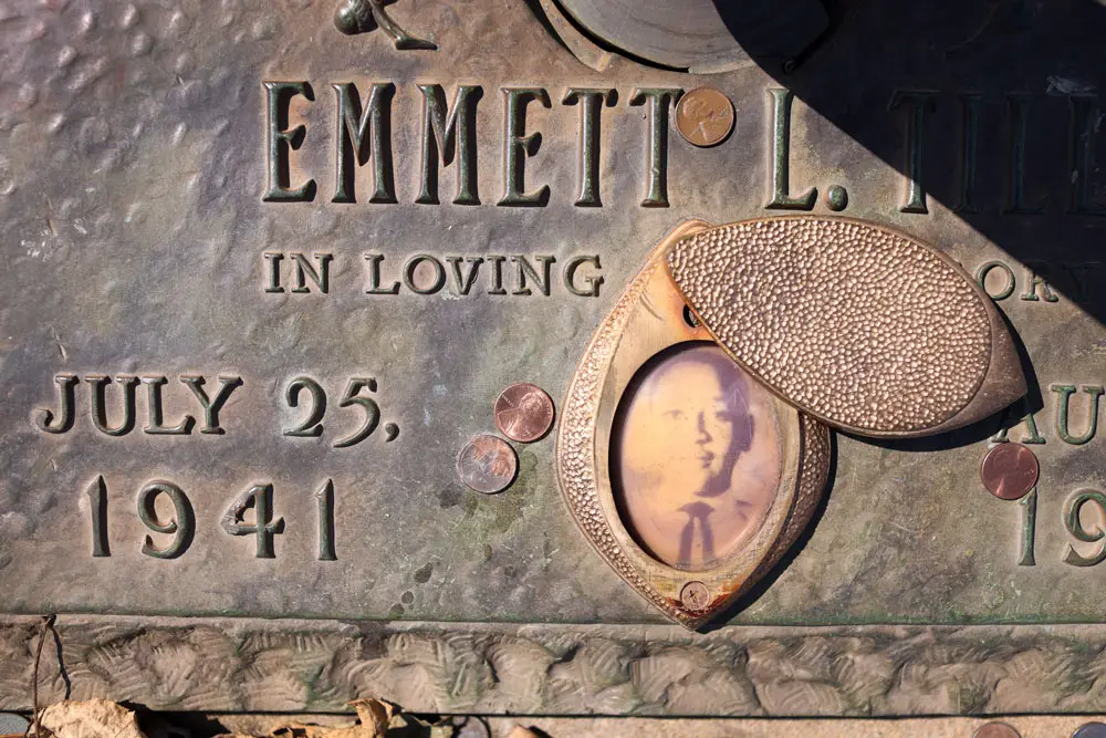 A faded photograph is attached to the headstone that marks the gravesite of Emmett Till in Chicago. (Scott Olson/Getty Images)