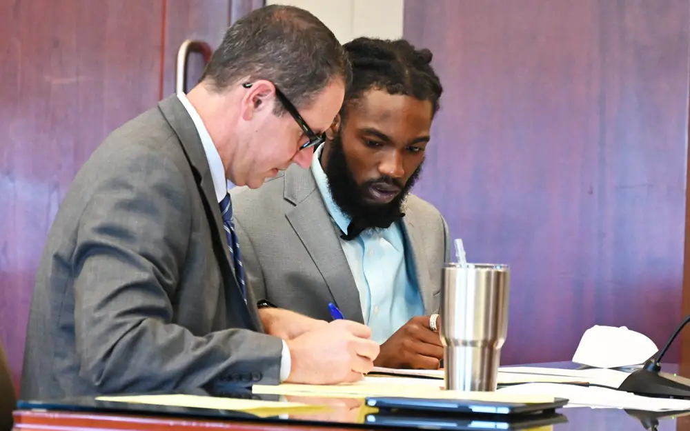 Deviaun Toler, right, at his trial with his attorney, John Hager. (© FlaglerLive)