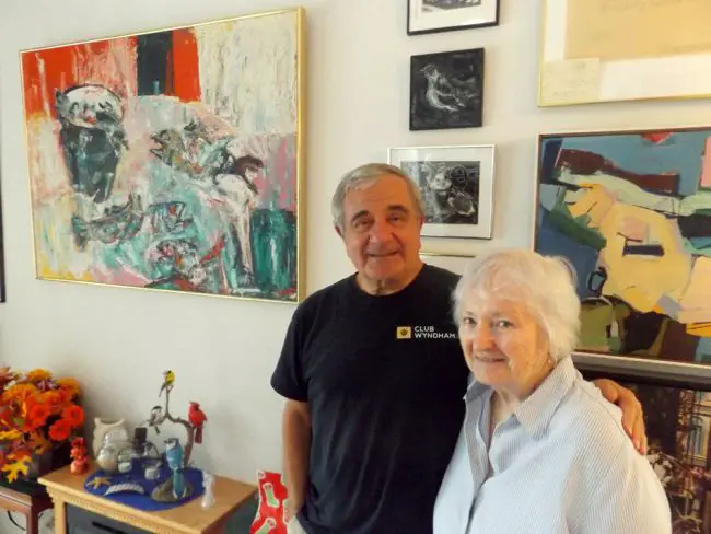 Tom Gargiulo and Arlene Volpe, pictured here in their Palm Coast home, founded the Gargiulo Art Foundation 20 years ago. The GAF typically honors its Flagler County Artist of the Year with an exhibition and opening reception, but a gallery closing forced the cancellation of this year’s show honoring Lee Richards. (© FlaglerLive)
