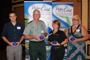 The award winners. From left, Jason Hutsel of the Flagler Fish Company, Anthony Greaves, a Florida park ranger at Gamble Rogers State Park, Sky Austin of Marineland Dolphin Adventure, and  Kellie Scribner of Best Western Click on the image for larger view. (Tourist Development Council)