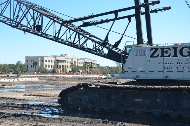 Palm Coast's future city hall, under construction in Town Center, helped attract new commercial tenants to the long-dormant first floor of the Cite building nearby. (c FlaglerLive)