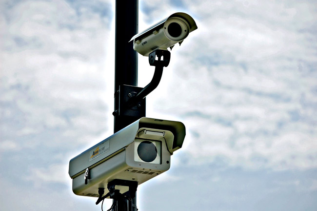 American Traffic Solutions spy-and-snap traffic cameras, at an intersection near you. (© FlaglerLive)