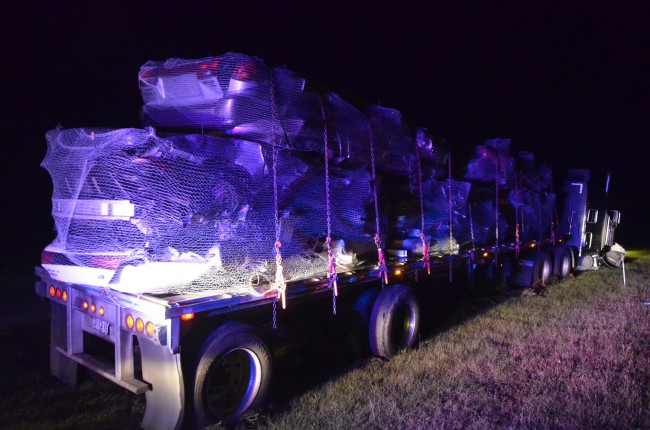 The trailer was carrying scrap cars from Fort Pierce to Savannah. Click on the image for larger view. (© FlaglerLive)