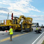 The extractor makes its way up State Road A1A early this morning. (© FlaglerLive)