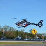 Trauma One, thje emergency helicopter, lifting off from the northbound lanes of I-95 near the juncture with State Road 100, with one patient, at 2 p.m. this afternoon. (c FlaglerLive)