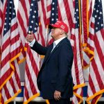 Former President Donald Trump’s rallies evoke nostalgia and patriotism. (AP Photo/Steve Helber)